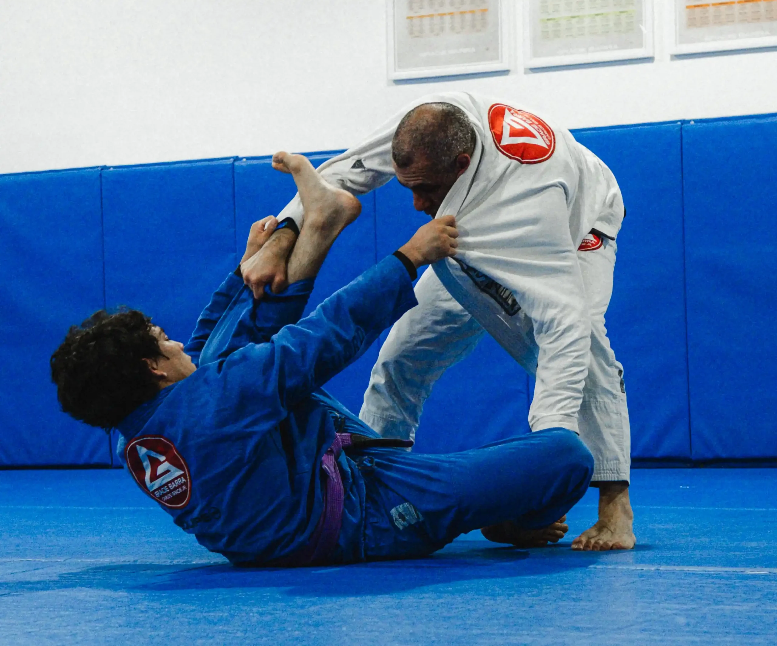 Gracie Barra Long Beach, CA - Jiu-Jitsu & Self-Defense 6 Instructor working guard passes one-on-one with a student